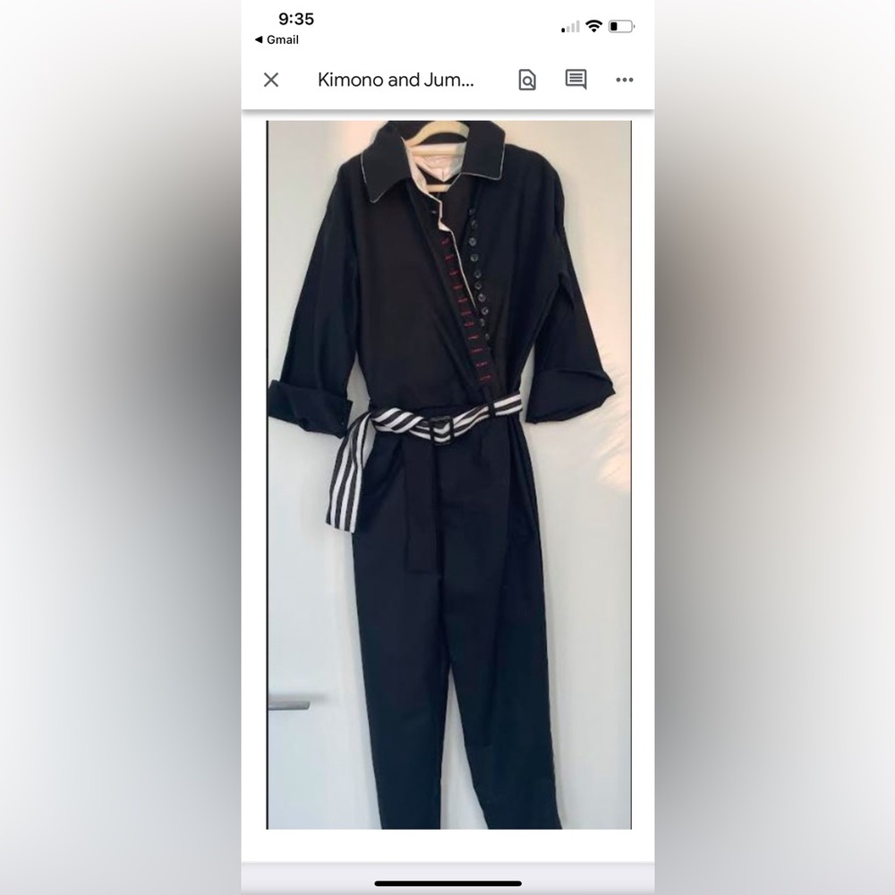Stylish Black Jumpsuit with Striped Belt